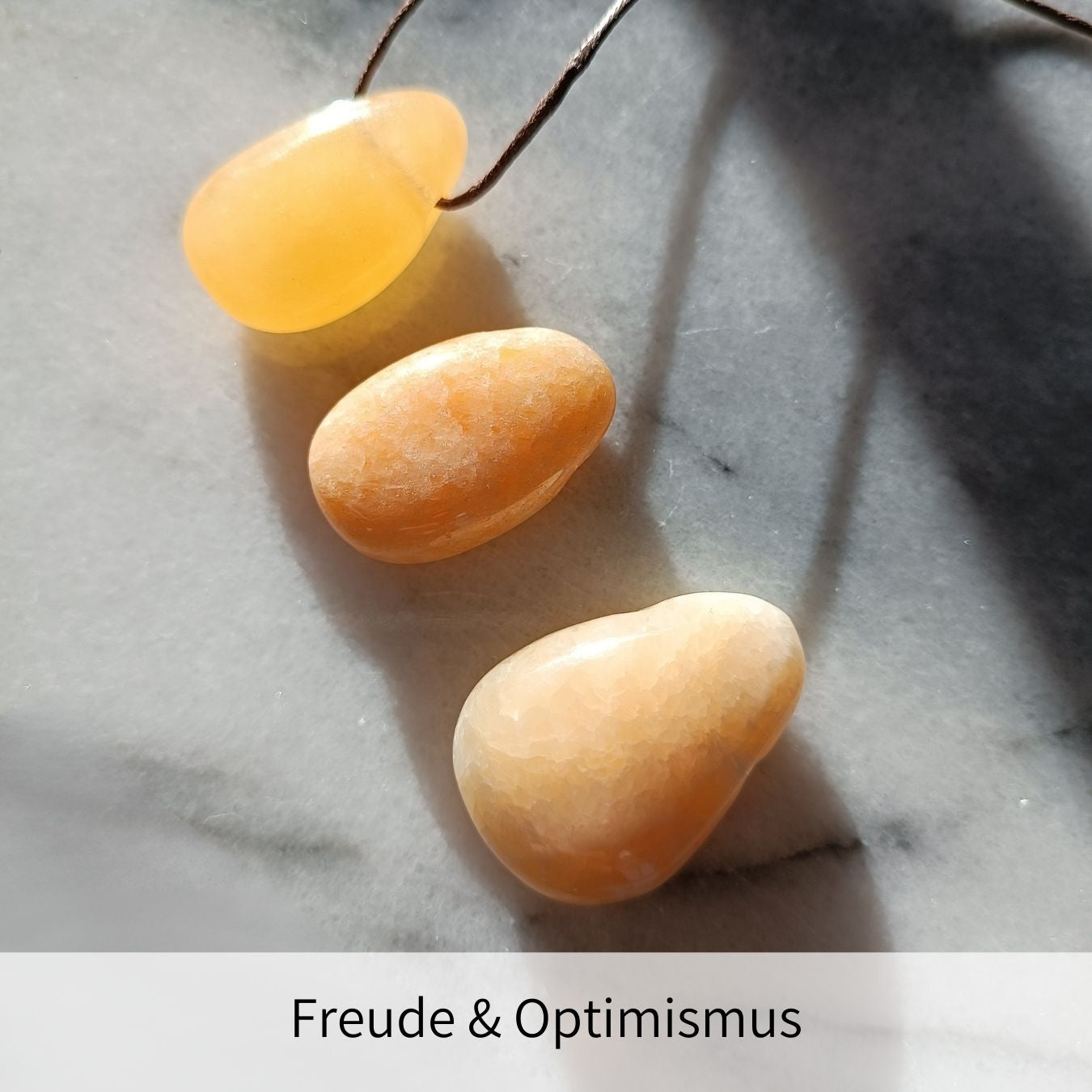 Orangencalcit Anhänger gebohrt